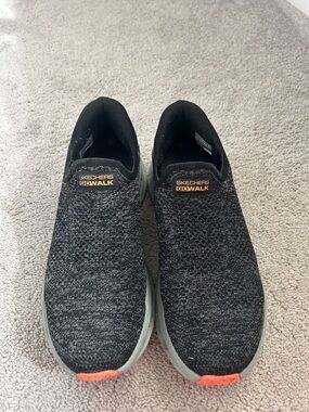 Skechers GOwalk Men's Black Knit Slip-On Sneakers with Orange Accents